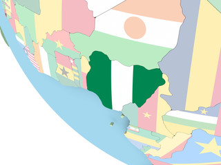 Nigeria with flag on globe