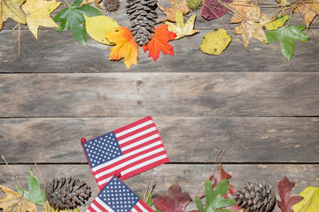 fall scene with American flag on wood table