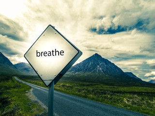 breathe - road sign in Scotland Highlands