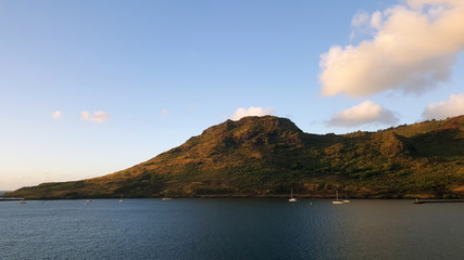 The coast of Hawaiian Islands with boats and the pacific ocean