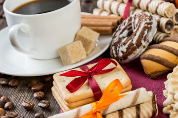 Biscuits and coffee on table