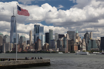 Urban new york american landscape with skyscrapers and usa flag