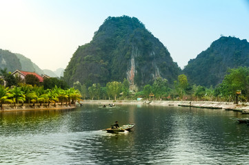 Traveling by boat on streams YEN in Hanoi, Vietnam. 
