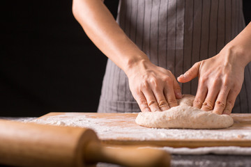 Obraz na płótnie Canvas Kneading dough prepare