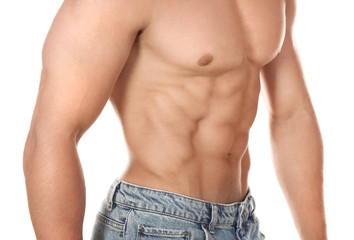 Naklejka premium Sporty young man on white background, closeup