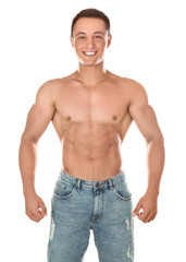 Fototapeta premium Sporty young man on white background