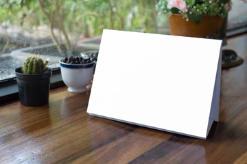 Mock up Label the blank menu frame in Bar restaurant ,Stand for booklets with white sheets paper...