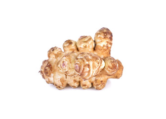 whole fresh Jerusalem Artichoke on white background