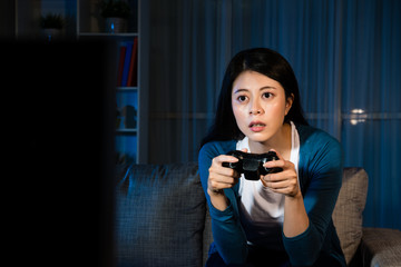 attractive girl holding joystick controller