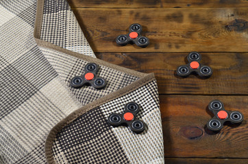 Popular finger spinner device. Modern fidget spinning toy on bearings. Spin it in hands & learn...