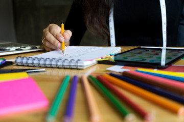 young fashion designer work on the table