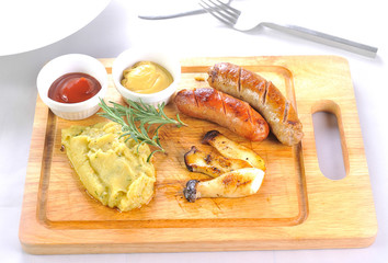 Grilled sausages with sauce