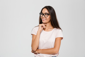 Portrait of a smiling young asian woman in eyeglasses