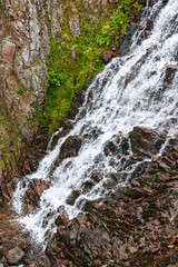 Waterfall in the mountain tundra, Kola Peninsula, Russia.
