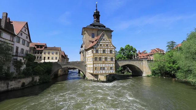 Bamberg. View of Old Town Hall of Bamberg (Altes Rathaus) with two bridges over the Regnitz river, Bavaria, Germany
