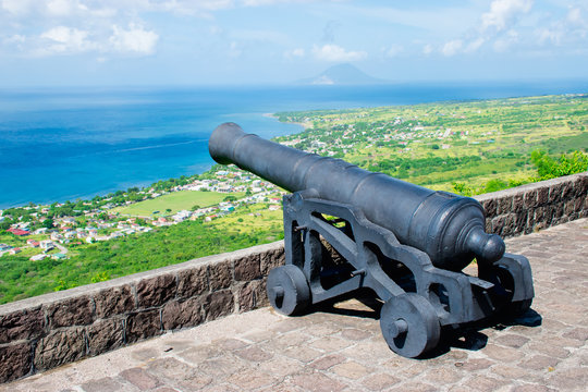 Cannon Brimstone Hill Fort, St. Kitts.
Caribbean Sea background view.