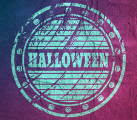 Stamp with Halloween text and pumpkin icons. Round shape. Grunge distress texture