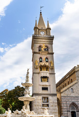 the tower of Duomo and fountain of Orione in Messina, sicily, italy,