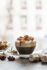 Glass of coffee with popcorn