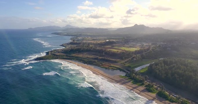 Amazing aerial view of the Hawaii nature, beac, Pacific ocean waves during sunset time. View on the beach at the Kauai island
