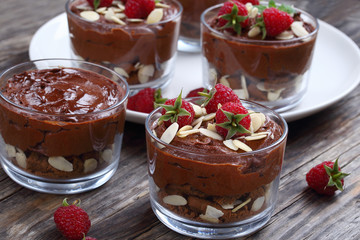 chocolate mousse in cups on table