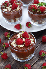 tasty chocolate mousse in glass cups