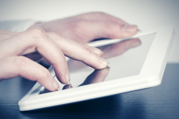 Business woman using tablet computer