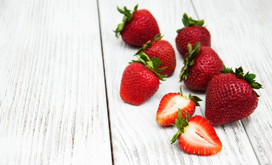 ripe strawberries on wooden table