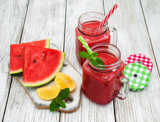 Jars with watermelon smoothie