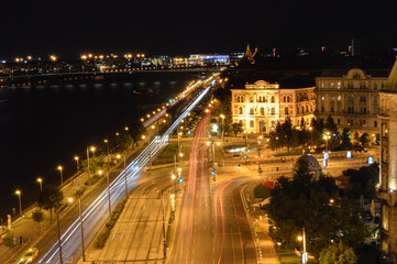 Fototapeta na wymiar Traffic lights in a steet of Budapest, at night