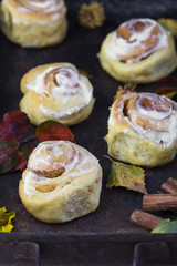 fresh pumpkin cinnabon buns with cinnamon and frosting
