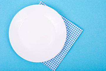 Bright pastel background with plate