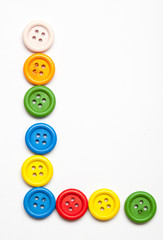 Sewing button alphabet: L