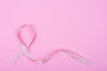Healthcare, medicine concept. Pink breast cancer awareness ribbon and  help illness people