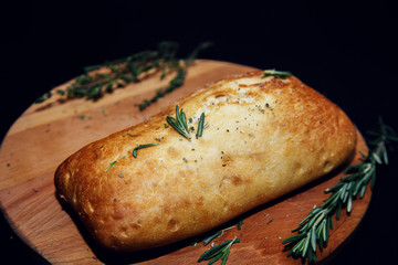 Traditional Italian ciabatta bread with herbs.