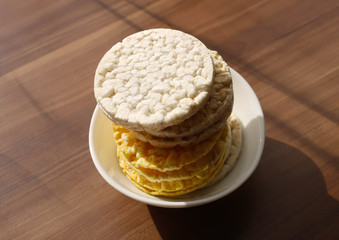 White rice crackers on blue background.