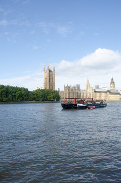 River Thames with Boat and Parliament in Background