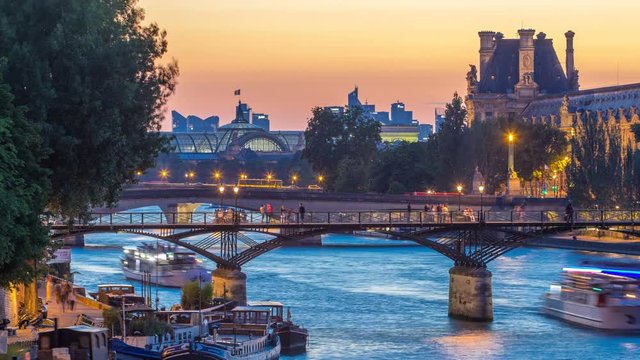 View on Pont des Arts in Paris after sunset day to night timelapse, France