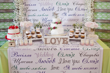 Fototapeta na wymiar Dessert table for a wedding party
