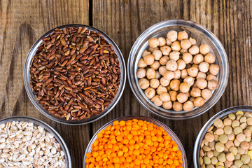 Vegan  meal. Healthy organic cereals on wooden background