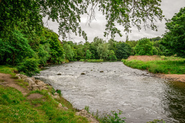 A view of River Don flowing in Seaton park in summer time, Aberdeen, Scotland