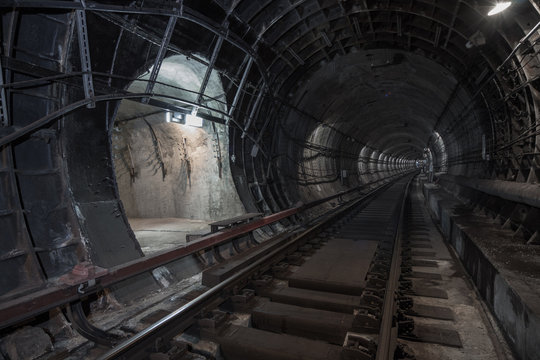 Underground tunnel. Rail way in a subway tunnel. 