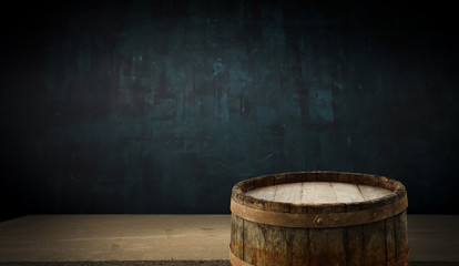 background barrel and worn old table of wood