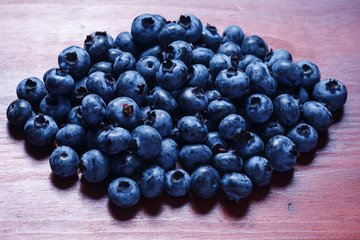sweet blueberry on the brown table close up