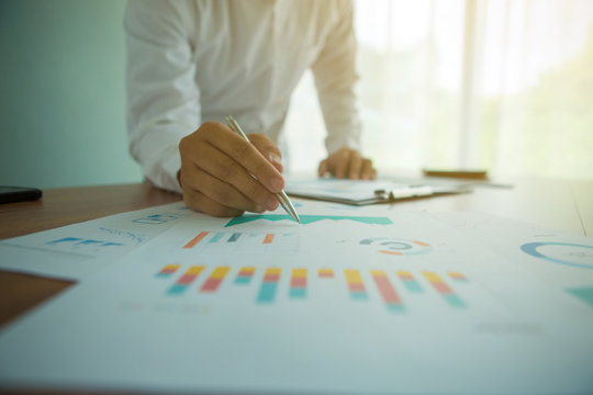businessman hand working and business strategy as concept,