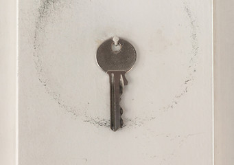Simple key hanging in a garage