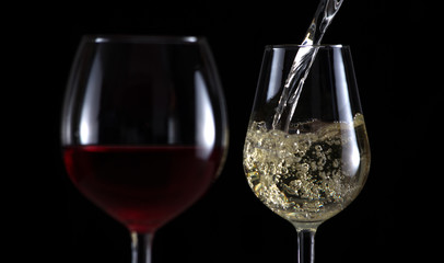 Beautiful splash of wine in a glass