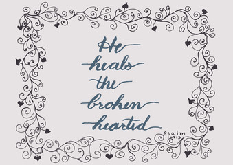He heals the brokenhearted; Christianity art of bible verse calligraphy with flora drawing decoration frame