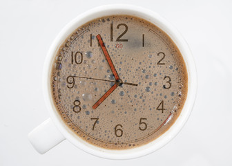 Fototapeta na wymiar Turkish coffee time concept, alarm clock placed in coffee. 