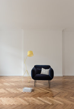 Empty armchair with lamp in living room